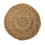 Round woven placemat on a white background