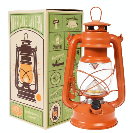 Orange hurricane lantern with packaging on a white background
