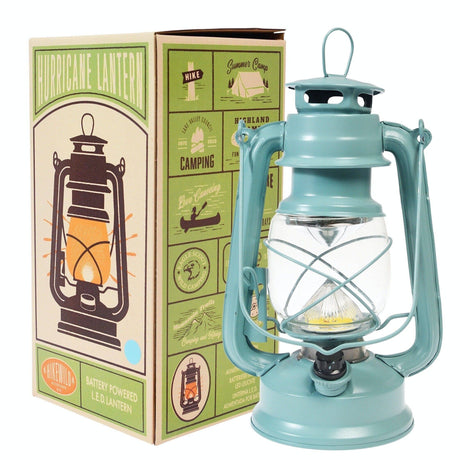 Turquoise lantern with clear glass and packaging on a white background