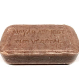 Bar of soap with text on a white background