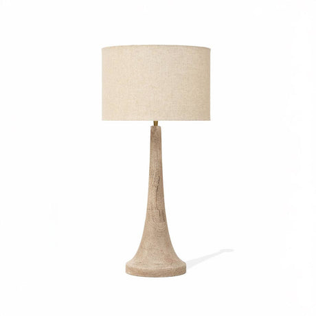 Table lamp with a beige lampshade and base on a white background