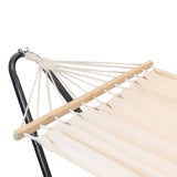 White hammock with wooden beams and black metal stand on a white background