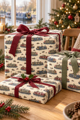 Three narrowboat Christmas gift parcels with burgundy and sage ribbons in a bright canal-side cottage.