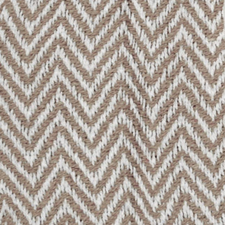Pattern of brown and white zigzag lines on a textured fabric background