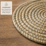 Handmade palm leaf placemat with product details on a neutral background