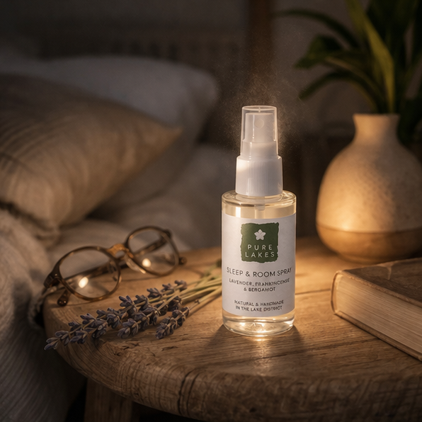 Pure lakes room spray on bed side table