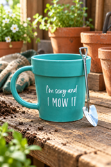 Gardening slogan plant pot mug and shovel spoon on a potting bench