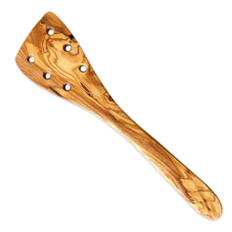 Wooden spatula with holes on a white background