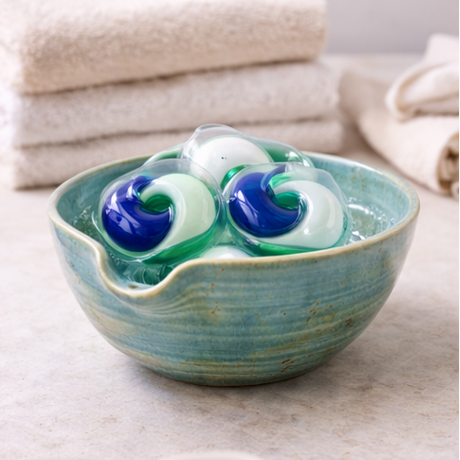 stoneware bowls used for holding laundry tablets.