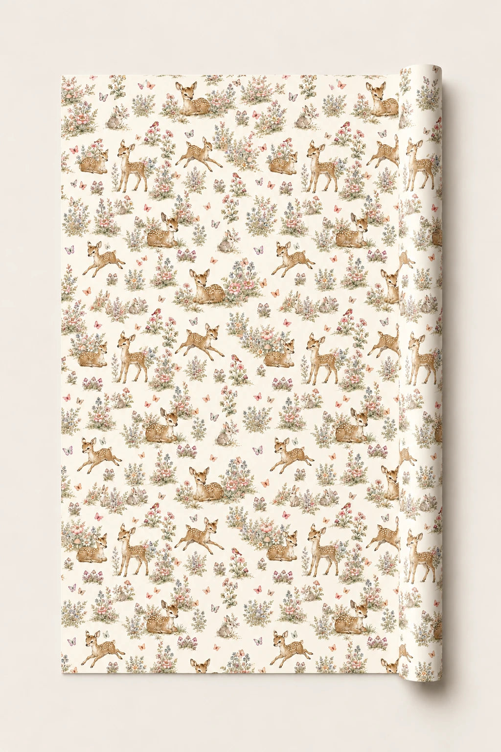 Woodland fawn wrapping paper roll with spotted deer, rabbits, butterflies and meadow flowers on a cream background.